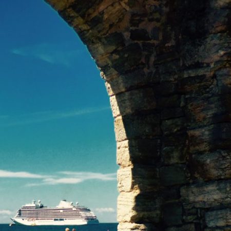 A view of our luxury cruise ship from inside the ancient city walls of Visby, Sweden.